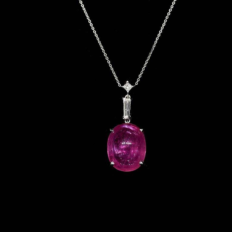 White gold pendant with ruby cabochon and diamonds