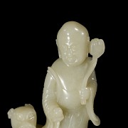 Carved jade figurine ‘Luohan with foo dog’, Qing dynasty