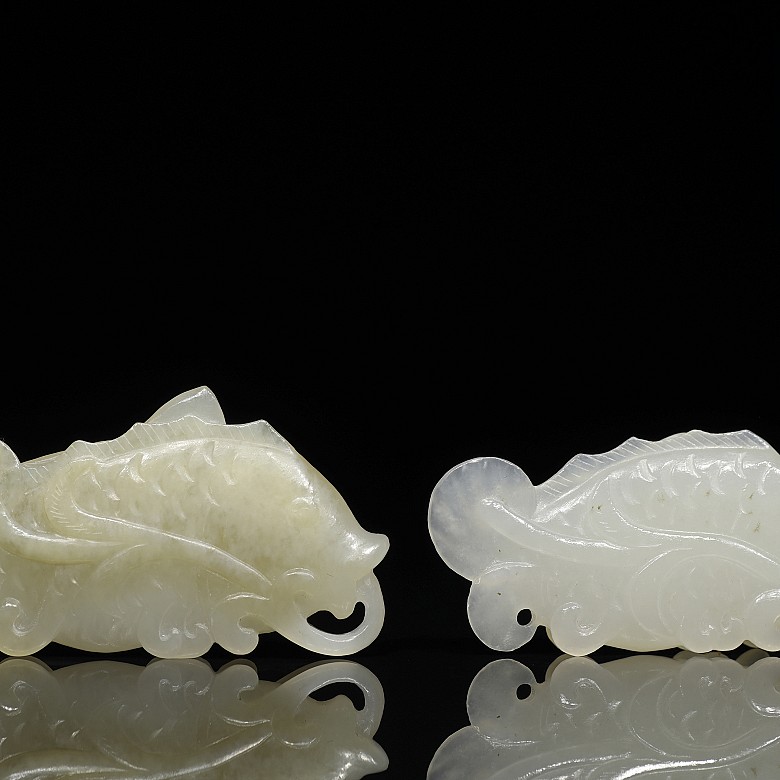 Two white jade fish plaques, 20th century