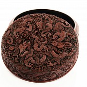 A carved cinnabar lacquer 