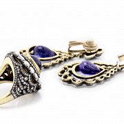 Ring and earring set in 18k gold with tanzanite and diamonds.