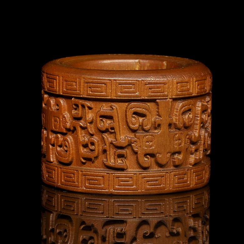 Carved wooden ring, 20th Century