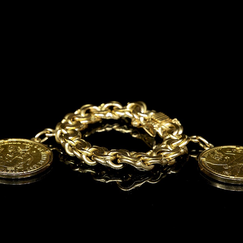 Pulsera con dos monedas de oro