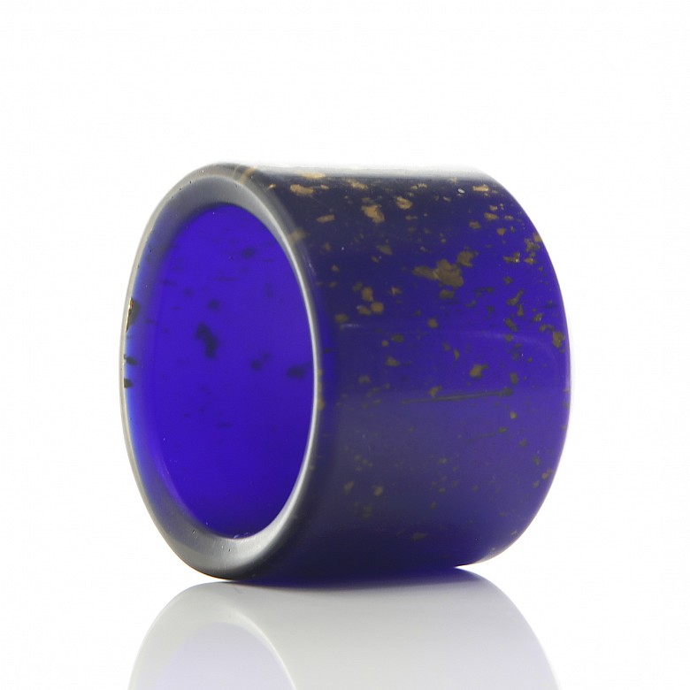 Archer's ring of blue glass and gold leaf shavings, 20th century