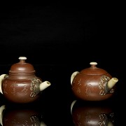 Two earthenware teapots, Yixing, 20th century