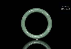 Carved green jadeite bangle, 20th century