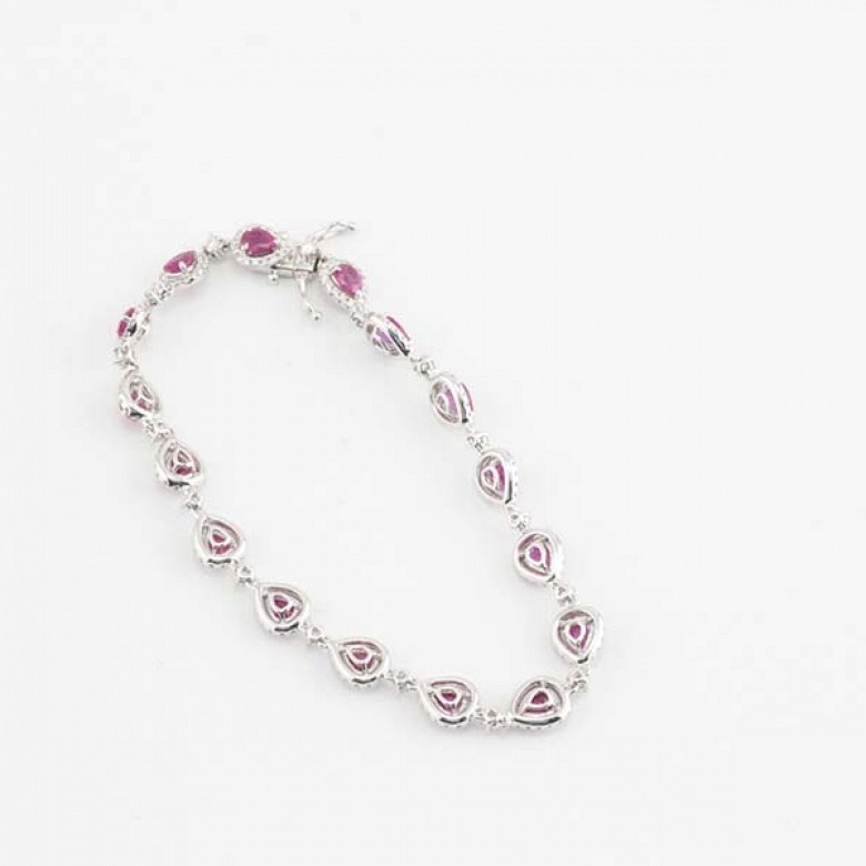 18k white gold bracelet with rubies and diamonds.