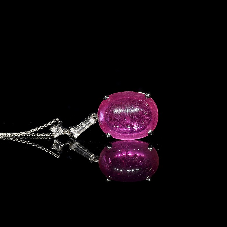 White gold pendant with ruby cabochon and diamonds