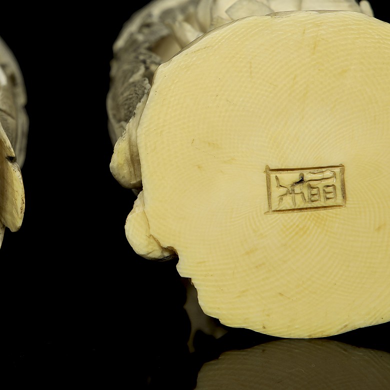 Pair of ivory carvings ‘Phoenix on branch’, early 20th century