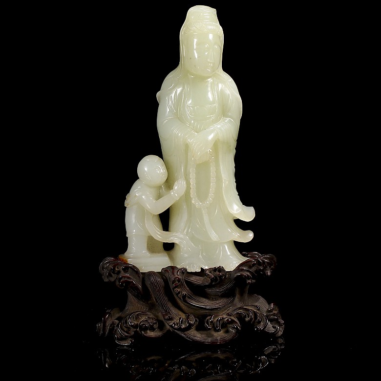 Hetian “Guanyin and Shancai” white jade figurine, Qing dynasty