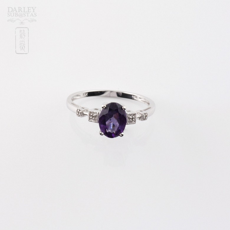 18k white gold ring with amethyst and diamonds.