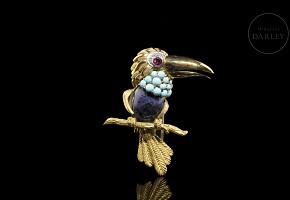 Yellow gold brooch with toucan shape