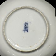 Pair of small porcelain plates, 20th century