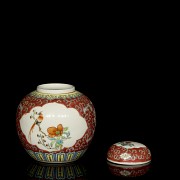 Three plates and a small jar of Asian porcelain “ famille rose”, 20th century