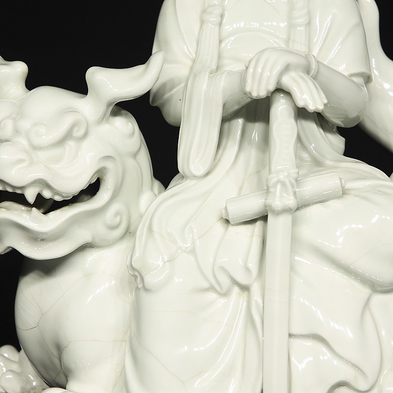 Porcelain figurine ‘Manjushri on foo dog’, Qing Dynasty