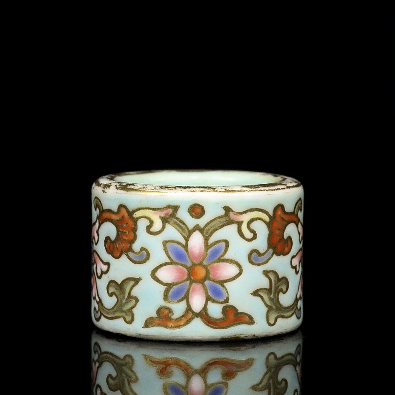 Porcelain enameled archer ring, 20th century