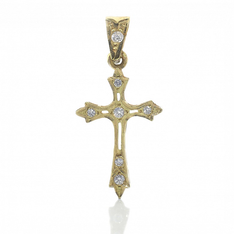 Openwork cross in 18k yellow gold and zircons