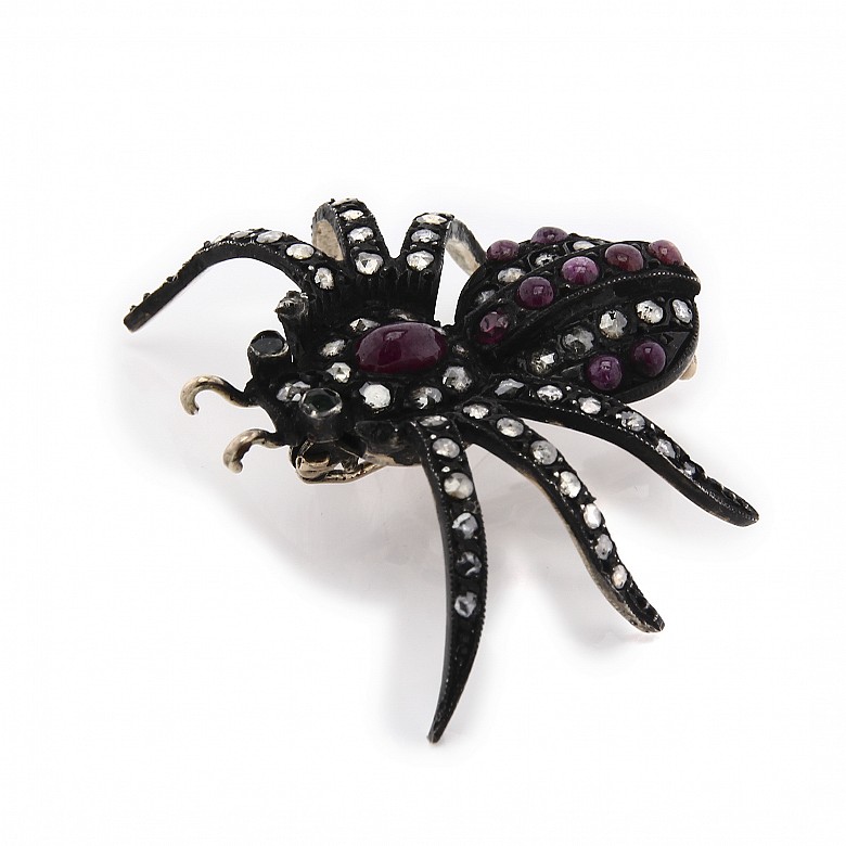 Broche de plata con forma de araña.