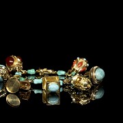 Yellow gold bracelet with pendants and coloured stones