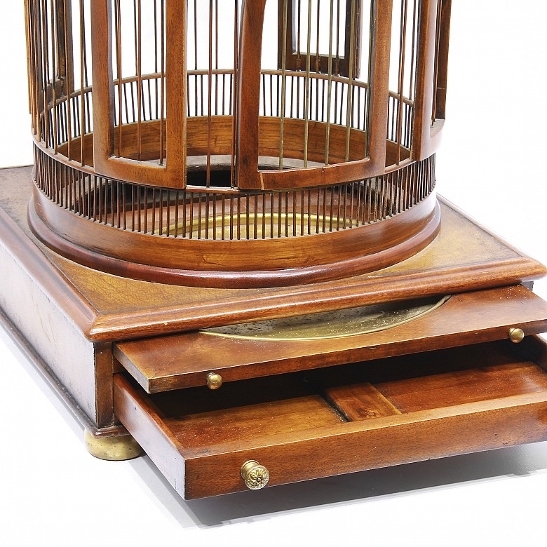 Wood and brass bird cage.