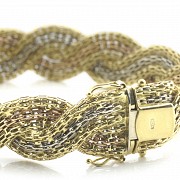 Braided bracelet in 18k gold