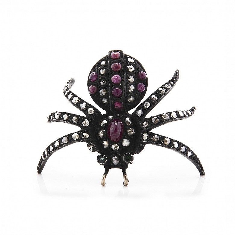 Broche de plata con forma de araña.