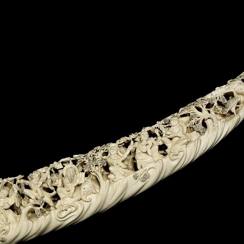 Carved ivory tusk ‘Immortals’ on wooden base, 19th century