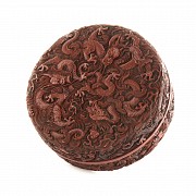 A carved cinnabar lacquer 