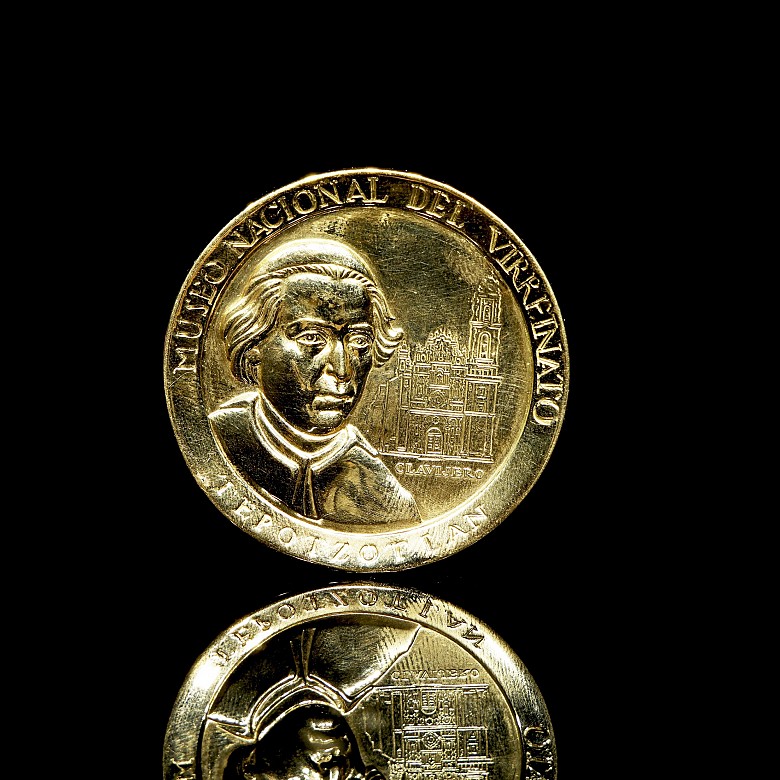 Moneda medalla de oro 