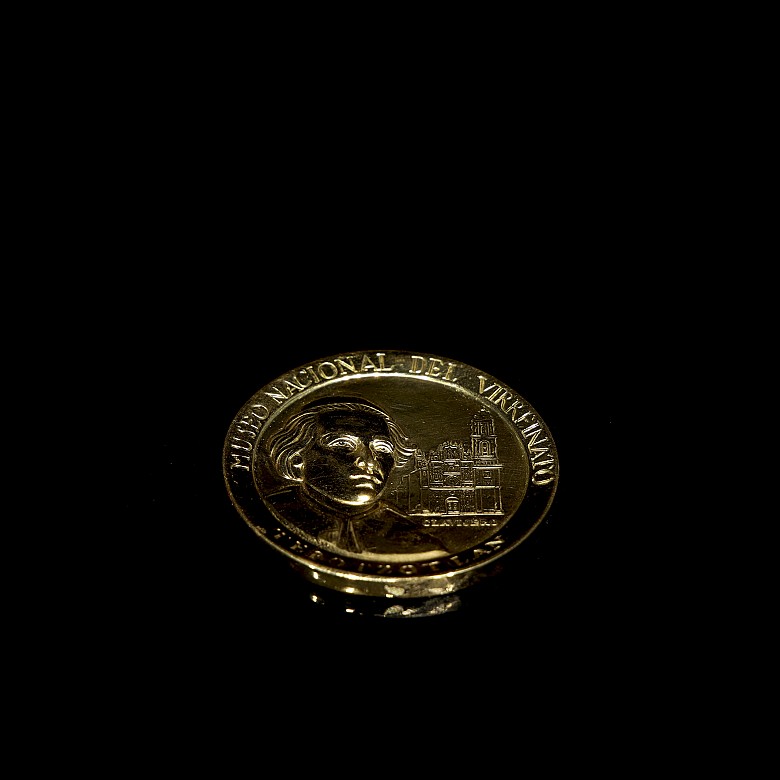 Moneda medalla de oro 