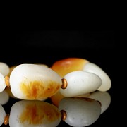 Eight-bead carved white jade bracelet, 20th century