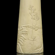 A carved ivory wrist rest, 19th century