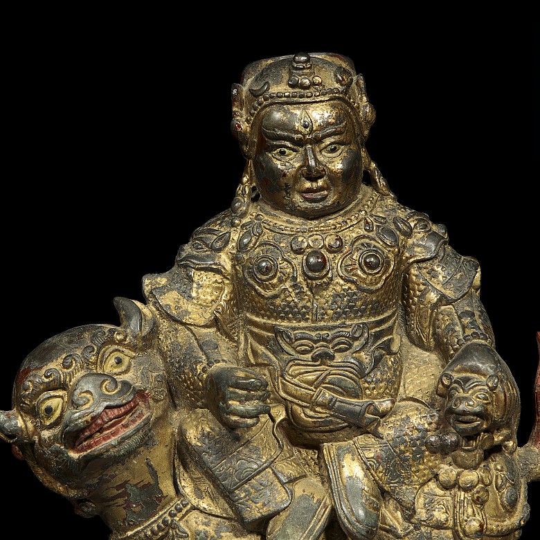 Sculpture of Buddha on lion.