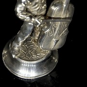 Conjunto de figuras de plata 