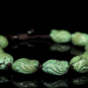 Bracelet with ten carved turquoise beads, Eastern Zhou Dynasty