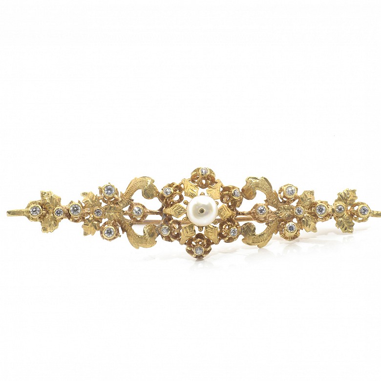 18k yellow gold and zirconia brooch