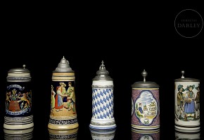 Five glazed ceramic beer steins, 20th century