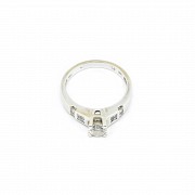 Solitaire diamond ring.