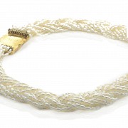 Rice pearl necklace and 18k gold clasp