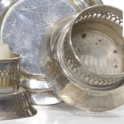 Set of Bulgari silver candleholders and other candleholders and plates, 20th century