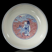 Porcelain plate in red, blue and white ‘The Eight Immortals’, with Qianlong trademark