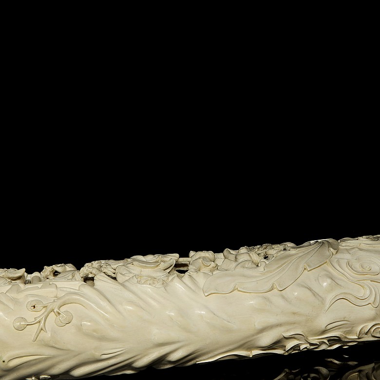 Carved ivory tusk ‘Immortals’ on wooden base, 19th century