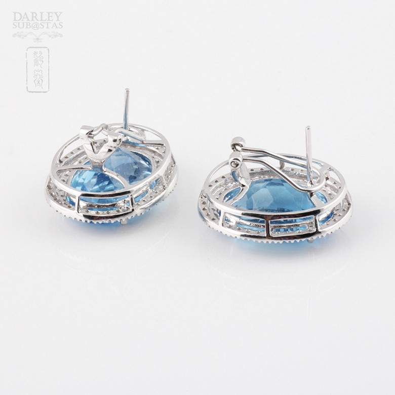 Topaz and diamond earrings in 18k white gold.