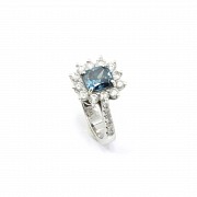 18k white gold ring with blue Fancy diamond.