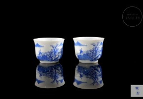 Pair of small porcelain ‘Landscape’ cups, Qing dynasty