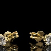 Pendientes de oro amarillo 18 k y brillantes 0,60 ct.