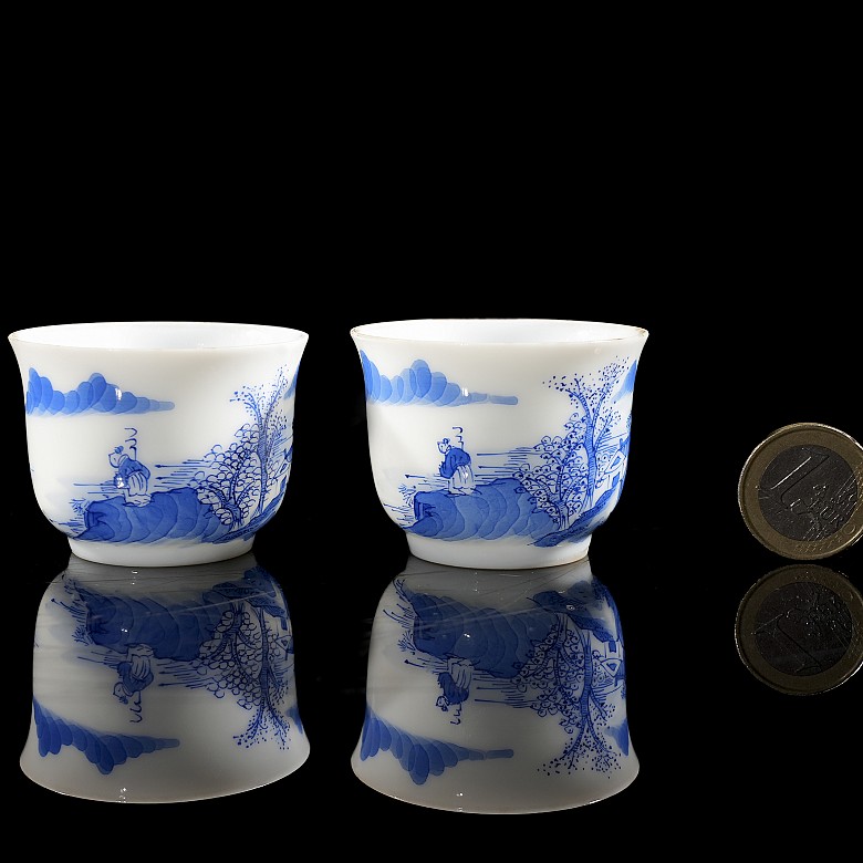 Pair of small porcelain ‘Landscape’ cups, Qing dynasty