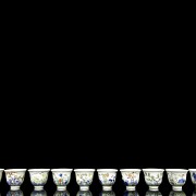 Complete set of twelve cups with flowers, 20th century