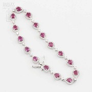 18k white gold bracelet with rubies and diamonds.