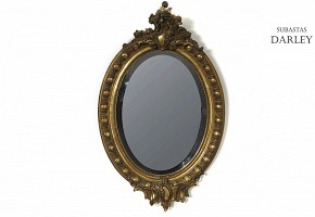 Carved and gilded wooden mirror, 20th century